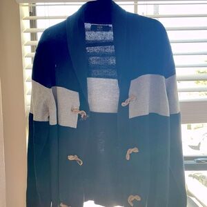 Beautiful cardigan. No Blemishes, stains. great cardigan for fall & winter.